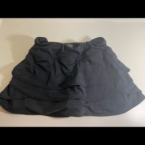 SOLD Athleta girl black swing skort size M (8-10)